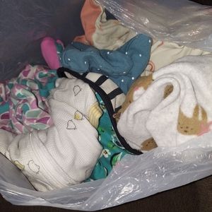 Bag of gently used one piece pj's newborn